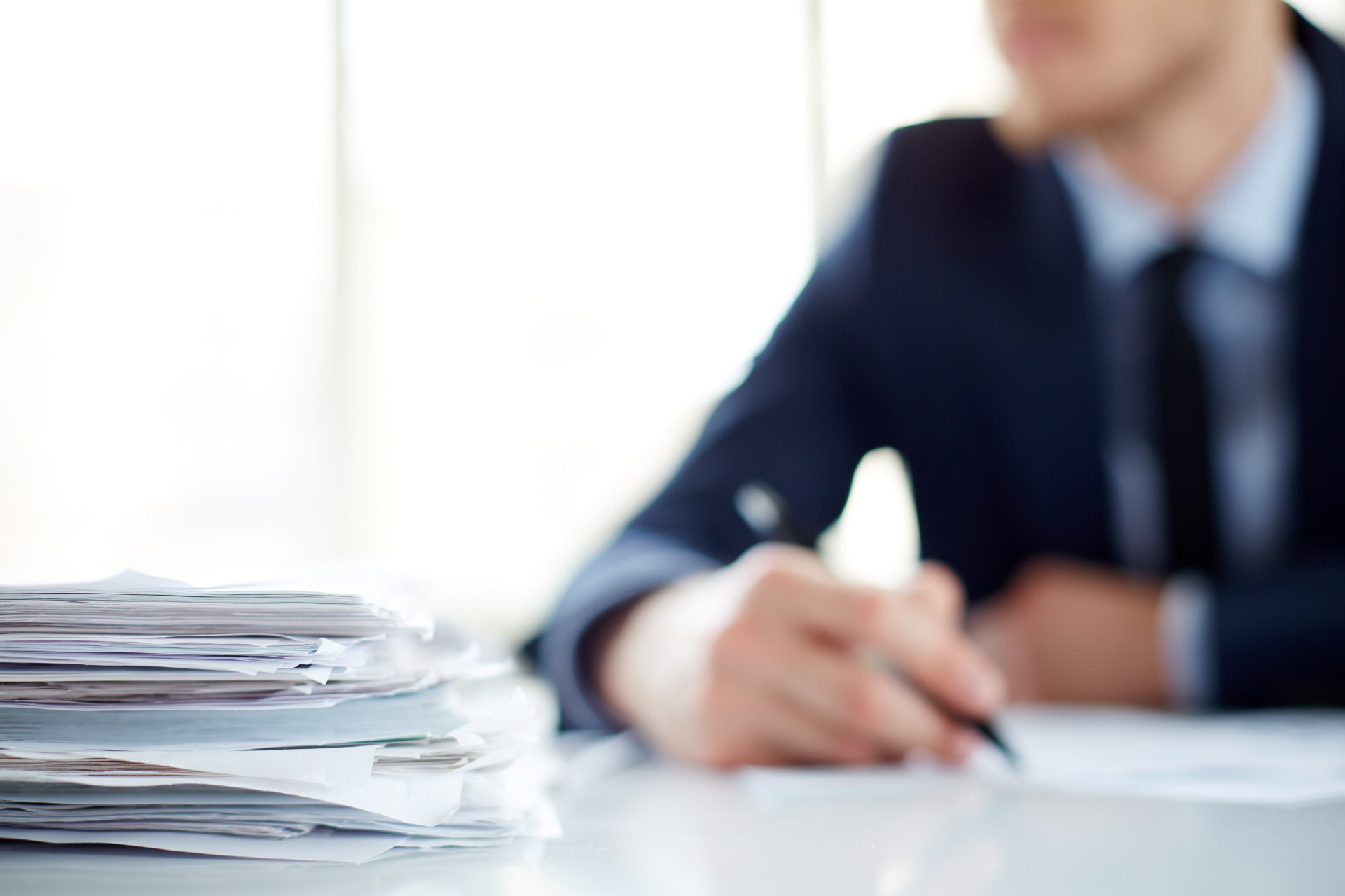 Pile papers on office table